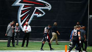 ATLANTA, GA - SEPTEMBER 27: Arthur Blank, owner of the Atlanta Falcons watches on as Thomas Dimitroff leaves the field with head coach Dan Quinn at the conclusion of an NFL game against the Chicago Bears at Mercedes-Benz Stadium on September 27, 2020 in Atlanta, Georgia. (Photo by Todd Kirkland/Getty Images)
