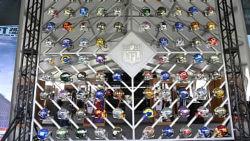 CLEVELAND, OHIO - APRIL 28: Wall of NFL team helmets on display in the NFL Locker Room at the NFL Draft Experience on April 28, 2021 in Cleveland, Ohio. (Photo by Duane Prokop/Getty Images)