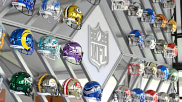 CLEVELAND, OHIO - APRIL 28: Wall of NFL team helmets on display inside the NFL Locker Room at the NFL Draft Experience on April 28, 2021 in Cleveland, Ohio. (Photo by Duane Prokop/Getty Images)