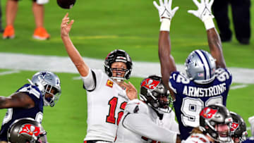 TAMPA, FLORIDA - SEPTEMBER 09: Tom Brady #12 of the Tampa Bay Buccaneers passes against the Dallas Cowboys during the first quarter at Raymond James Stadium on September 09, 2021 in Tampa, Florida. (Photo by Julio Aguilar/Getty Images)