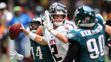 ATLANTA, GEORGIA - SEPTEMBER 12: Matt Ryan #2 of the Atlanta Falcons looks to pass during the second half against the Philadelphia Eagles at Mercedes-Benz Stadium on September 12, 2021 in Atlanta, Georgia. (Photo by Kevin C. Cox/Getty Images)