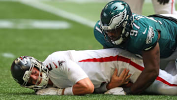 ATLANTA, GEORGIA - SEPTEMBER 12: Javon Hargrave #97 of the Philadelphia Eagles sacks Matt Ryan #2 of the Atlanta Falcons during the fourth quarter at Mercedes-Benz Stadium on September 12, 2021 in Atlanta, Georgia. (Photo by Todd Kirkland/Getty Images)