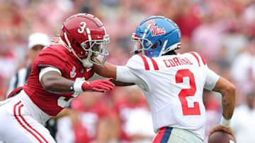 TUSCALOOSA, ALABAMA - OCTOBER 02: Daniel Wright #3 of the Alabama Crimson Tide pressures Matt Corral #2 of the Mississippi Rebels during the first half at Bryant-Denny Stadium on October 02, 2021 in Tuscaloosa, Alabama. (Photo by Kevin C. Cox/Getty Images)