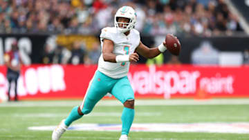 LONDON, ENGLAND - OCTOBER 17: Tua Tagovailoa #1 of the Miami Dolphins throws the ball during the NFL London 2021 match between Miami Dolphins and Jacksonville Jaguars at Tottenham Hotspur Stadium on October 17, 2021 in London, England. (Photo by Alex Pantling/Getty Images)