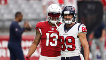 GLENDALE, ARIZONA - OCTOBER 24: Christian Kirk #13 of the Arizona Cardinals and Danny Amendola #89 of the Houston Texans meet before the game at State Farm Stadium on October 24, 2021 in Glendale, Arizona. (Photo by Chris Coduto/Getty Images)