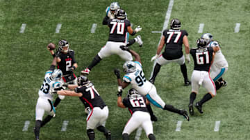 ATLANTA, GEORGIA - OCTOBER 31: Matt Ryan #2 of the Atlanta Falcons throws a pass in the third quarter against the Carolina Panthers at Mercedes-Benz Stadium on October 31, 2021 in Atlanta, Georgia. (Photo by Mark Brown/Getty Images)
