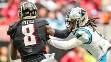 ATLANTA, GEORGIA - OCTOBER 31: Stephon Gilmore #9 of the Carolina Panthers defends against Kyle Pitts #8 of the Atlanta Falcons during the game at Mercedes-Benz Stadium on October 31, 2021 in Atlanta, Georgia. (Photo by Mark Brown/Getty Images)