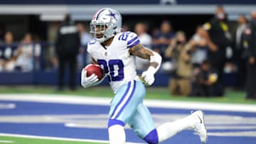 ARLINGTON, TEXAS - NOVEMBER 07: Tony Pollard #20 of the Dallas Cowboys returns a kickoff during the third quarter against the Denver Broncos at AT&T Stadium on November 07, 2021 in Arlington, Texas. (Photo by Richard Rodriguez/Getty Images)