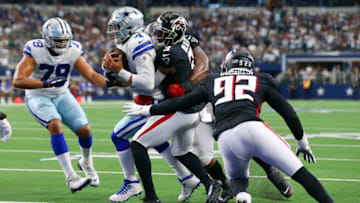 ARLINGTON, TEXAS - NOVEMBER 14: Dak Prescott #4 of the Dallas Cowboys runs for a touchdown against the Atlanta Falcons during the third quarter at AT&T Stadium on November 14, 2021 in Arlington, Texas. (Photo by Richard Rodriguez/Getty Images)