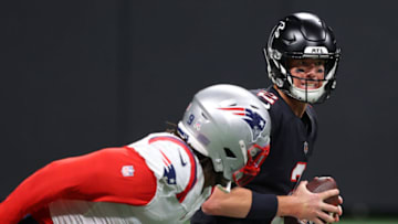 ATLANTA, GEORGIA - NOVEMBER 18: Matt Ryan #2 of the Atlanta Falcons is sacked by Matt Judon #9 of the New England Patriots in the second quarter at Mercedes-Benz Stadium on November 18, 2021 in Atlanta, Georgia. (Photo by Kevin C. Cox/Getty Images)