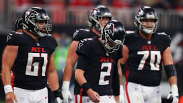 ATLANTA, GEORGIA - DECEMBER 05: Matt Ryan #2 of the Atlanta Falcons reacts after getting sacked during the third quarter against the Tampa Bay Buccaneers at Mercedes-Benz Stadium on December 05, 2021 in Atlanta, Georgia. (Photo by Kevin C. Cox/Getty Images)