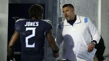 NASHVILLE, TENNESSEE - DECEMBER 12: Head coach Mike Vrabel of the Tennessee Titans greets Julio Jones #2 after the game against the Jacksonville Jaguars at Nissan Stadium on December 12, 2021 in Nashville, Tennessee. (Photo by Andy Lyons/Getty Images)