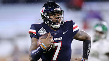 MOBILE, ALABAMA - DECEMBER 18: Malik Willis #7 of the Liberty Flames rushes for a touchdown during the second half of the LendingTree Bowl against the Eastern Michigan Eagles at Hancock Whitney Stadium on December 18, 2021 in Mobile, Alabama. (Photo by Jonathan Bachman/Getty Images)