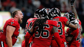 ATLANTA, GA - DECEMBER 07: Deion Jones #45 of the Atlanta Falcons celebrates with his teammates after intercepting a touchdown pass intended for Willie Snead #83 of the New Orleans Saints at Mercedes-Benz Stadium on December 7, 2017 in Atlanta, Georgia. (Photo by Kevin C. Cox/Getty Images)