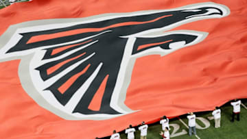 ATLANTA, GA - JANUARY 15: A giant flag with the Atlanta Falcons logo is seen on the field against the Green Bay Packers during their 2011 NFC divisional playoff game at Georgia Dome on January 15, 2011 in Atlanta, Georgia. (Photo by Kevin C. Cox/Getty Images)