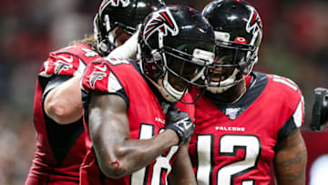 ATLANTA, GA - SEPTEMBER 15: Calvin Ridley #18 celebrates with Mohamed Sanu #12 of the Atlanta Falcons following his reception for a touchdown during the first half of a game against the Philadelphia Eagles at Mercedes-Benz Stadium on September 15, 2019 in Atlanta, Georgia. (Photo by Carmen Mandato/Getty Images)