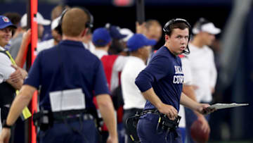ARLINGTON, TEXAS - AUGUST 29: Offensive coordinator Kellen Moore of the Dallas Cowboys on the sideline against the Tampa Bay Buccaneers in the fourth quarter of a NFL preseason game at AT&T Stadium on August 29, 2019 in Arlington, Texas. (Photo by Tom Pennington/Getty Images)