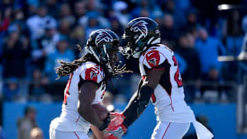 CHARLOTTE, NORTH CAROLINA - NOVEMBER 17: Desmond Trufant #21 celebrates with Damontae Kazee #27 of the Atlanta Falcons after intercepting a pass against the Carolina Panthers during the second quarter of their game at Bank of America Stadium on November 17, 2019 in Charlotte, North Carolina. (Photo by Grant Halverson/Getty Images)