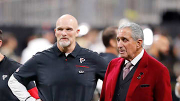 ATLANTA, GEORGIA - NOVEMBER 28: Head coach Dan Quinn of the Atlanta Falcons talks with owner Arthur Blank prior to the game against the New Orleans Saints at Mercedes-Benz Stadium on November 28, 2019 in Atlanta, Georgia. (Photo by Kevin C. Cox/Getty Images)