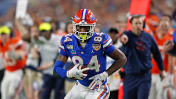 MIAMI GARDENS, FL - DECEMBER 30: Kyle Pitts #84 of the Florida Gators runs with the ball against the Virginia Cavaliers at the Capital One Orange Bowl at Hard Rock Stadium on December 30, 2019 in Miami Gardens, Florida. Florida defeated Virginia 36-28. (Photo by Joel Auerbach/Getty Images)