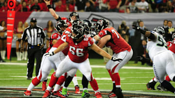 ATLANTA, GA - JANUARY 13: Matt Ryan #2 of the Atlanta Falcons passes behind blocking by Peter Konz #66 against the Seattle Seahawks during the NFC Divisional Playoff Game at the Georgia Dome on January 13, 2013 in Atlanta, Georgia (Photo by Scott Cunningham/Getty Images)