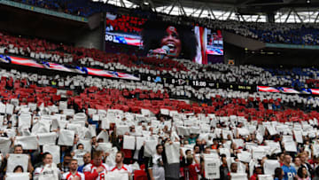 LONDON, ENGLAND - OCTOBER 26: NFL fans observe the USA national anthem during the NFL match between Detroit Lions and Atlanta Falcons at Wembley Stadium on October 26, 2014 in London, England. (Photo by Mike Hewitt/Getty Images)