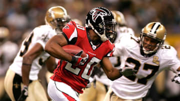 NEW ORLEANS - SEPTEMBER 25: Allen Rossum #20 of the Atlanta Falcons runs past Deuce McAllister #27 of the New Orleans Saints during the first quarter of the Monday Night Football game on September 25, 2006 at the Superdome in New Orleans, Louisiana. Tonight's game marks the first time since Hurricane Katrina struck last August, that the Superdome, which served as a temporary shelter to thousands of stranded victims in the wake of Katrina, has played host to an NFL game. (Photo by Ronald Martinez/Getty Images)
