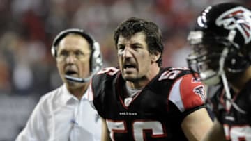 ATLANTA - NOVEMBER 23: Linebacker Keith Brooking #56 of the Atlanta Falcons cheers a defensive play against the Carolina Panthers at the Georgia Dome on November 23, 2008 in Atlanta, Georgia. (Photo by Al Messerschmidt/Getty Images)