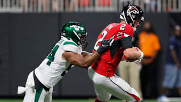 ATLANTA, GEORGIA - AUGUST 15: Matt Ryan #2 of the Atlanta Falcons is sacked by Avery Williamson #54 of the New York Jets during the first half of the preseason game at Mercedes-Benz Stadium on August 15, 2019 in Atlanta, Georgia. (Photo by Kevin C. Cox/Getty Images)