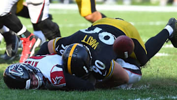 PITTSBURGH, PA - OCTOBER 07: Matt Ryan #2 of the Atlanta Falcons fumbles the ball as he is hit by T.J. Watt #90 of the Pittsburgh Steelers in the fourth quarter during the game at Heinz Field on October 7, 2018 in Pittsburgh, Pennsylvania. (Photo by Joe Sargent/Getty Images)