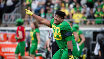 Apr 20, 2019; Eugene, OR, USA; Oregon Ducks offensive lineman Penei Sewell (58) points the scoreboard after the Oregon spring game at Autzen Stadium. Mighty Oregon beat Fighting Ducks 20-13. Mandatory Credit: Troy Wayrynen-USA TODAY Sports