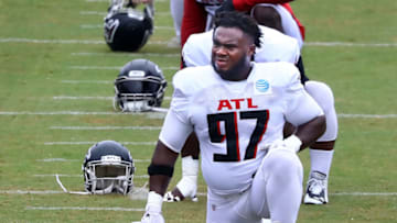 Aug 24, 2020; Flowery Branch, GA, USA; Atlanta Falcons defensive tackle Grady Jarrett loosens up for the second scrimmage on Monday, August 24, 2020 in Flowery Branch. Mandatory Credit: Curtis Compton/Pool Photo via USA TODAY Sports