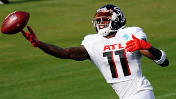Aug 26, 2020; Flowery Branch, GA, USA; Atlanta Falcons wide receiver Julio Jones (11) catches a ball during an NFL football training camp practice on Wednesday, Aug. 26, 2020, in Flowery Branch, Ga. Mandatory Credit: Brynn Anderson/Pool Photo-USA TODAY Sports