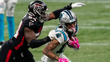 Oct 11, 2020; Atlanta, Georgia, USA; Carolina Panthers wide receiver Robby Anderson (11) is tackled by Atlanta Falcons linebacker Foyesade Oluokun (54) during the first quarter at Mercedes-Benz Stadium. Mandatory Credit: Dale Zanine-USA TODAY Sports