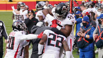 Dec 27, 2020; Kansas City, MO, USA; Atlanta Falcons strong safety Keanu Neal (22) celebrates with teammates after an interception against the Kansas City Chiefs in the first half of a NFL game at Arrowhead Stadium. Mandatory Credit: Denny Medley-USA TODAY Sports
