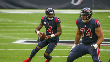 Dec 27, 2020; Houston, Texas, USA; Houston Texans quarterback Deshaun Watson (4) runs the ball against the Cincinnati Bengals during the second quarter at NRG Stadium. Mandatory Credit: Troy Taormina-USA TODAY Sports