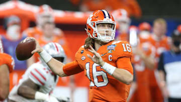 Jan 1, 2021; New Orleans, LA, USA; Clemson Tigers quarterback Trevor Lawrence (16) attempts a pass against the Ohio State Buckeyes during the second half at Mercedes-Benz Superdome. Mandatory Credit: Chuck Cook-USA TODAY Sports