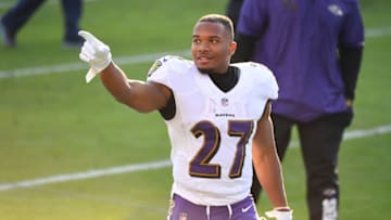 Jan 10, 2021; Nashville, Tennessee, USA; Baltimore Ravens running back J.K. Dobbins (27) celebrates after the AFC Wild Card playoff game win against the Tennessee Titans at Nissan Stadium. Mandatory Credit: Christopher Hanewinckel-USA TODAY Sports