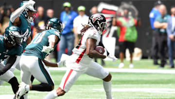 Sep 12, 2021; Atlanta, Georgia, USA; Atlanta Falcons running back Cordarrelle Patterson (84) carries the ball against the Philadelphia Eagles during the first quarter at Mercedes-Benz Stadium. Mandatory Credit: John David Mercer-USA TODAY Sports