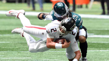 Sep 12, 2021; Atlanta, Georgia, USA; Atlanta Falcons quarterback Matt Ryan (2) dives as he scrambles up the fields against Philadelphia Eagles cornerback Avonte Maddox (29) during the first quarter at Mercedes-Benz Stadium. Mandatory Credit: John David Mercer-USA TODAY Sports