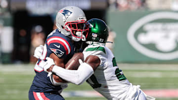 Sep 19, 2021; East Rutherford, New Jersey, USA; New York Jets free safety Marcus Maye (20) tackles New England Patriots running back James White (28) during the second half at MetLife Stadium. Mandatory Credit: Vincent Carchietta-USA TODAY Sports