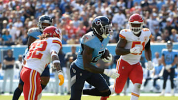 Oct 24, 2021; Nashville, Tennessee, USA; Tennessee Titans wide receiver Julio Jones (2) splits Kansas City Chiefs free safety Tyrann Mathieu (32) and defensive end Michael Danna (51) during the first half at Nissan Stadium. Mandatory Credit: Steve Roberts-USA TODAY Sports