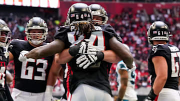 Oct 31, 2021; Atlanta, Georgia, USA; Atlanta Falcons running back Cordarrelle Patterson (84) gets a hug from offensive tackle Jalen Mayfield (77) after scoring a touchdown against the Carolina Panthers during the first half at Mercedes-Benz Stadium. Mandatory Credit: Dale Zanine-USA TODAY Sports