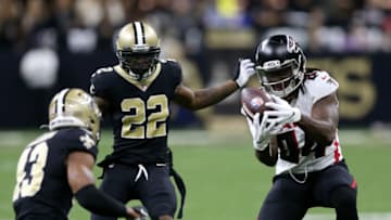 Nov 7, 2021; New Orleans, Louisiana, USA; Atlanta Falcons running back Cordarrelle Patterson (84) makes a catch between New Orleans Saints defensive backs Chauncey Gardner-Johnson (22) and Marcus Williams (43) during the first quarter at the Caesars Superdome. Mandatory Credit: Chuck Cook-USA TODAY Sports