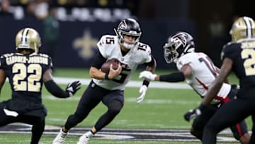 Nov 7, 2021; New Orleans, Louisiana, USA; Atlanta Falcons quarterback Feleipe Franks (15) is defended by New Orleans Saints defensive back Chauncey Gardner-Johnson (22) during the first quarter at the Caesars Superdome. Mandatory Credit: Chuck Cook-USA TODAY Sports