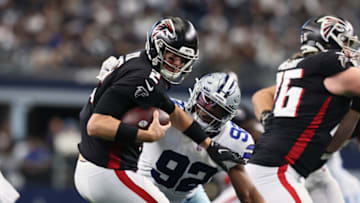 Nov 14, 2021; Arlington, Texas, USA; Dallas Cowboys defensive end Dorance Armstrong (92) sacks Atlanta Falcons quarterback Matt Ryan (2) in the second quarter at AT&T Stadium. Mandatory Credit: Matthew Emmons-USA TODAY Sports