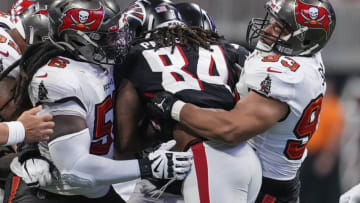 Dec 5, 2021; Atlanta, Georgia, USA; Tampa Bay Buccaneers defensive tackle Rakeem Nunez-Roches (56) and defensive tackle Ndamukong Suh (93) tackle Atlanta Falcons running back Cordarrelle Patterson (84) during the second half at Mercedes-Benz Stadium. Mandatory Credit: Dale Zanine-USA TODAY Sports