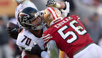 Dec 19, 2021; Santa Clara, California, USA; Atlanta Falcons offensive tackle Jake Matthews (70) defends against San Francisco 49ers defensive end Samson Ebukam (56) during the fourth quarter at Levi's Stadium. Mandatory Credit: Stan Szeto-USA TODAY Sports