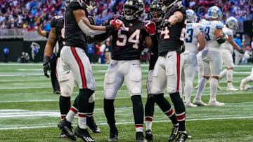 Dec 26, 2021; Atlanta, Georgia, USA; Atlanta Falcons inside linebacker Foye Oluokun (54) reacts with teammates after intercepting a pass against the Detroit Lions during the fourth quarter at Mercedes-Benz Stadium. Mandatory Credit: Dale Zanine-USA TODAY Sports