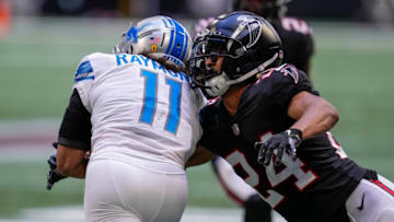 Dec 26, 2021; Atlanta, Georgia, USA; Atlanta Falcons cornerback A.J. Terrell (24) tackles Detroit Lions wide receiver Kalif Raymond (11) during the second half at Mercedes-Benz Stadium. Mandatory Credit: Dale Zanine-USA TODAY Sports